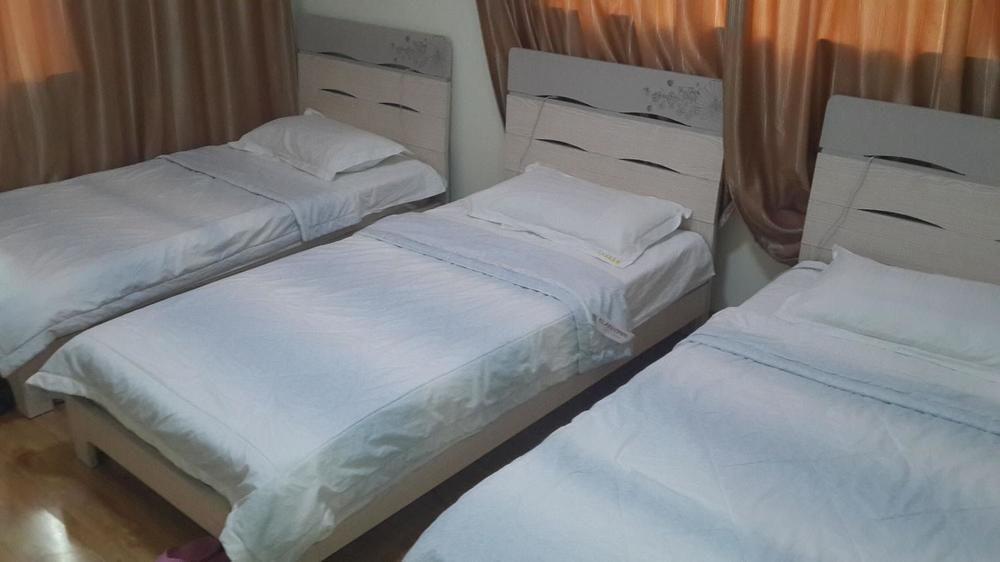 Qingdao Tianmanyi Hotel Buitenkant foto